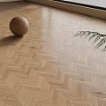 Light Wood Herringbone Pattern Floor With Wooden Ball And Fern In Sunlit Room