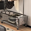 Metal Clothes Rack With Hanging Clothes And Storage Basket In Bedroom