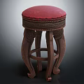 Elegant Wooden Stool with Red Cushion and Intricate Carved Legs