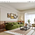 Elegant Living Room Interior With Green Sofa Decorative Paintings Natural Light And Plant