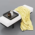 Modern White Footstool With Black Tray Decorative Items And Yellow Blanket On Black Legs