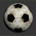Vintage Black And White Soccer Ball With Worn Texture On Dark Reflective Surface