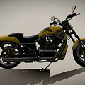 Yellow Vintage Motorcycle With Black Seat Round Headlight And Shiny Metal Body