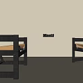 Two Modern Leisure Chairs With Black Frame And Beige Cushion In Simple Interior