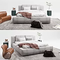 Modern Double Bed Interior With Gray Bedding Brown Leather Chair Potted Plant And Rug