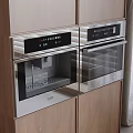Modern Built-in Kitchen Appliances With Stainless Steel Microwave Oven And Wooden Cabinets