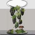 Indoor Landscape Featuring Transparent Cylindrical Container Hanging Rocks Green Plants And Small House Model