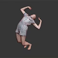 Child Performing Dance Move In Blue Denim Romper Barefoot On Gray Background