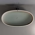 Modern Oval Shaped Cream Colored Bathtub In Bathroom Interior With Black Faucet