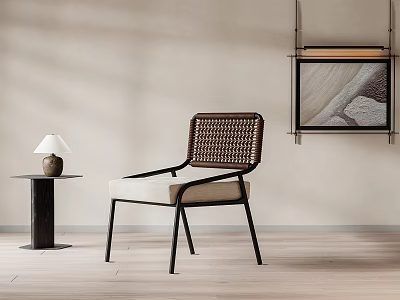 Minimalist Modern Leisure Chair With Woven Back Beige Cushion Black Frame Side Table And Lamp 3d model
