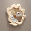 Mirror With Irregular Wavy White Frame Reflecting Bedroom Bed Pillows And Rug On Beige Wall