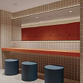 Shower Room Interior Featuring Orange Tiled Walls Multiple Cubicles And Towel Holders