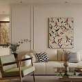 Stylish Living Room Interior With Beige Sofa Decorative Pillows Wall Painting Green Chair And Potted Plant