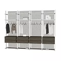 Modern Minimalist Wardrobe With Metal Frame Hanging Rods And Drawers Displaying Clothes On Hangers