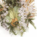 Artistic Natural Decorative Ornaments Arrangement With Green Fan Leaves White Clustered Blooms And Feathery Grass
