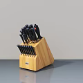Stainless Steel Kitchen Knives With Black Handles In Wooden Block Stand