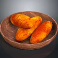 Three Golden Brown Roasted Sweet Potatoes in Wooden Plate on Dark Background
