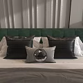 Textured Black And Light Gray Accent Pillows With Round Decor On Green Tufted Headboard Bed