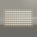 Elegant Golden Metal Partition With Perforated Geometric Patterns For Interior Spaces