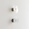 Modern Transparent Wall Lamps with Black Base Mounted on White Wall 3d model