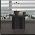 Modern Round Side Table with Wavy Black Base and Tea Set by Window View 3d model