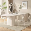 Modern White Dining Table Set With Oval Top Simple Chairs And Decorative Vase Plants