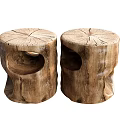 Two Rustic Wooden Tree Stump Shaped Stools With Natural Texture And Holes