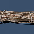 Bundled Dry Plant Twigs Tied Together With Natural Rope On Blue Background