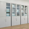 White Office Bookcases With Glass Doors And Neatly Arranged Blue Folders