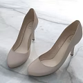 Light Beige High Heels Classic Design Placed On Smooth Marble Surface 3d model