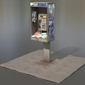 Public Telephone Booth With Advertisements And Metal Pole On Concrete Platform Outdoor