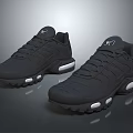 Black Mesh Upper Sneakers With White Cushioned Soles And Modern Design