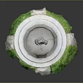 Traditional Stone Lion Fountain With Circular Base Carved Patterns And Green Grass