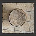 Handcrafted Rattan Stool With Round Woven Seat And Sturdy Curved Legs On Tile Floor