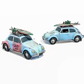 Two Classic Volkswagen Beetle Cars With Surfboards On Roof In Blue And Pink Colors