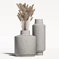 Two Concrete Vases With Speckled Texture Holding Dried Pampas Grass Arrangement