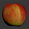 Juicy Ripe Red and Yellow Apple on Dark Background with Shiny Surface