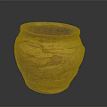 Hand Carved Yellow Brown Pottery Vase With Textured Surface And Artisan Details