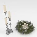 Silver Candle Holders With Candles And Green Wreath Decorations With Small Ornaments