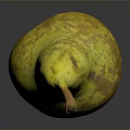 Ripe Yellowish Green Pear with Brown Spots on Dark Surface Showing Natural Texture and Reflection