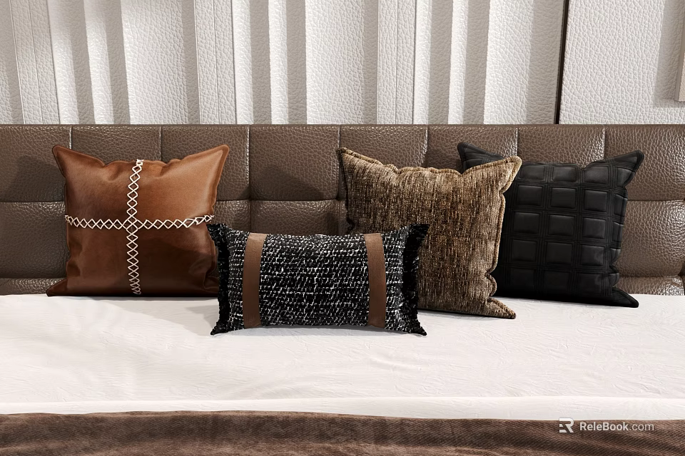 Brown and Black Decorative Pillows with Leather and Woven Textures on Bedroom Bed 3d model 