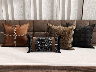Brown and Black Decorative Pillows with Leather and Woven Textures on Bedroom Bed 3d model