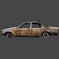 Burned Rusted Car With Damaged Body Broken Windows And Charred Remains