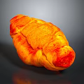 Golden Orange And Red Croissant With Shiny Crust On Dark Background