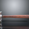 Claw Hammer with Metal Head and Wooden Handle on Black Smooth Surface and Reflection