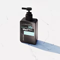 LUXE Moisture Black Cosmetic Bottle With Pump Dispenser On Marble Surface
