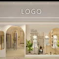 Modern Clothing Store Window Display With White Outfit Mannequins Green Plants And Lighting