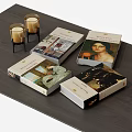 Art Themed Hardcover Books With Painting Covers On Wooden Table And Decorative Candles