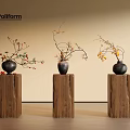 Minimalist Black Vases With Flower Branches Placed On Wooden Pedestals Against Light Wall