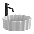 White Petal Shaped Washbasin with Black Faucet and Smooth Interior Design
